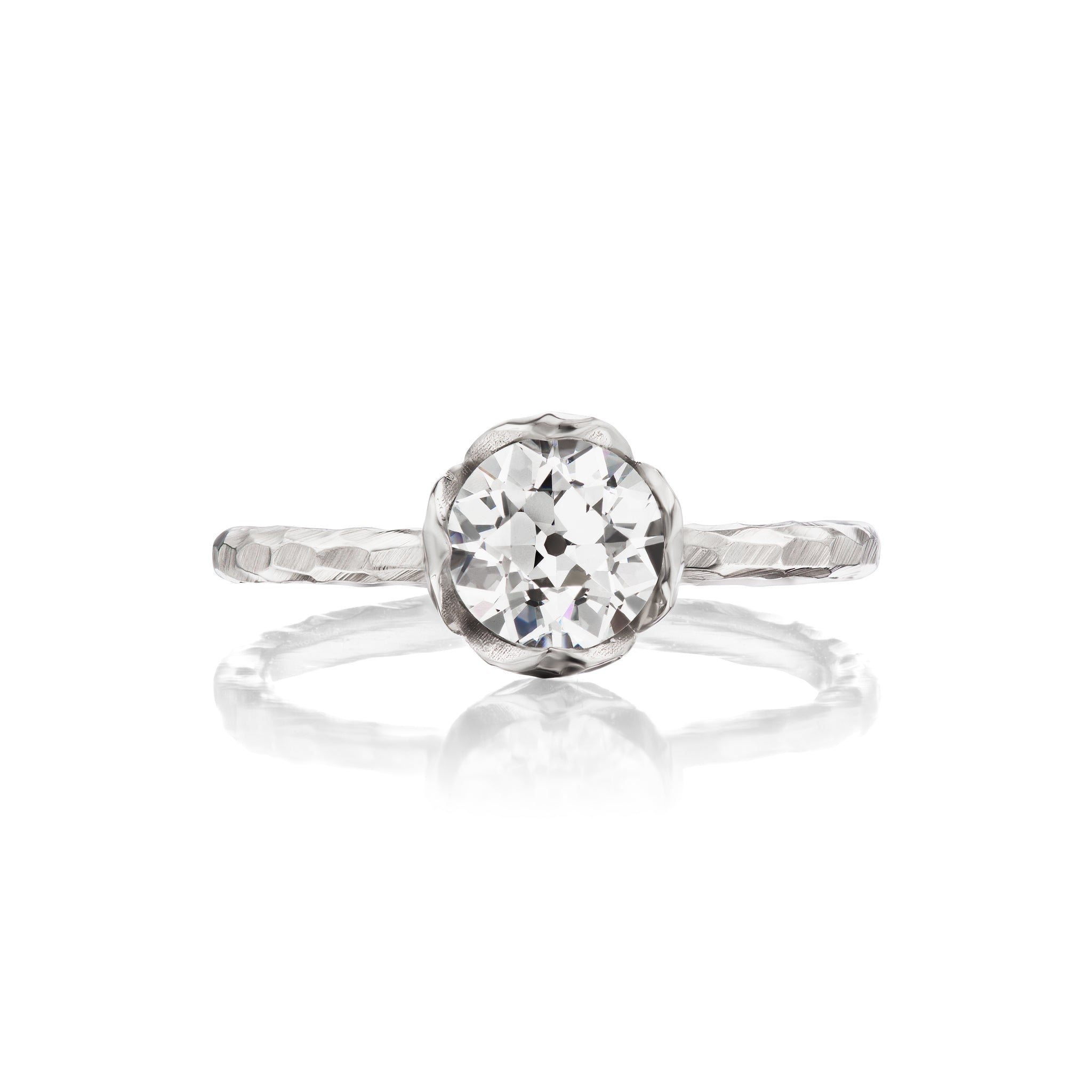 Petal-Set Solitaire Faceted Ring
